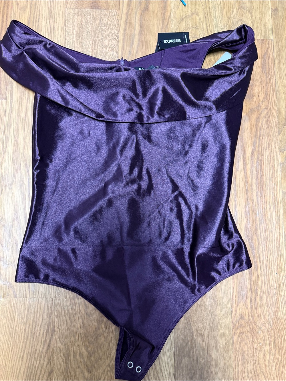 Express Satin Off-Shoulder One-Piece Bodysuit in Plum